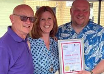 Kevin Lenton, BSE chairman, deputy mayor of Wokingham town council, Cllr Alexandra Domingue, present Andy Parker, owner of Elusive Brewing, with his certificate.