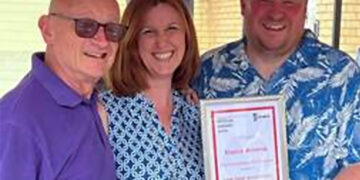 Kevin Lenton, BSE chairman, deputy mayor of Wokingham town council, Cllr Alexandra Domingue, present Andy Parker, owner of Elusive Brewing, with his certificate.