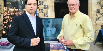 Andy Ng with Wokingham MP Clive Jones.