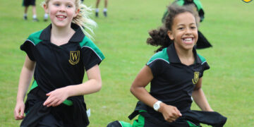 Pupils at Waverley Prep School ran to raise funds for Wokingham charity The Cowshed. Pictures: Waverley School