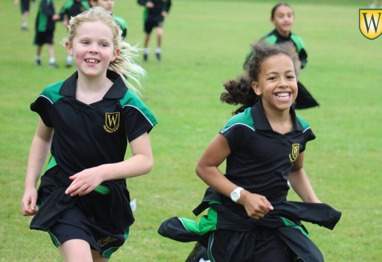 Pupils at Waverley Prep School ran to raise funds for Wokingham charity The Cowshed. Pictures: Waverley School