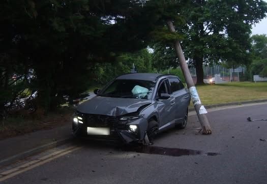 A photo of a Hyundai SUV apparently involved in a crash with a lamppost at Shepherds Hill in Woodley. Credit :Peter Wheat