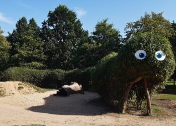 The living willow caterpillar in the nature play area has been carefully shaped, woven and restored by rangers.