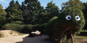 The living willow caterpillar in the nature play area has been carefully shaped, woven and restored by rangers.