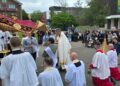 The Corpus Christi procession stops at the University of Reading Whiteknights campus for a bible reading. Credit: Our Lady of Peace Earley