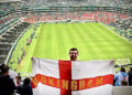 Nick Axhwell and the flag in Mexico City this morning.