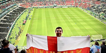Nick Axhwell and the flag in Mexico City this morning.