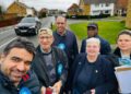 Councillors Pauline Jorgensen, second from right, and Moses Iyengumwena, both Conservative councillors for Hillside ward, are petitioning for a solution for parking during matchdays in Lower Earley. Credit: Pauline Jorgensen.