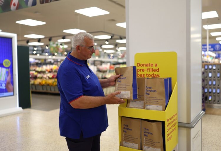 Tesco pre-filled food donation bags can help feed struggling families. Picture: Tesco