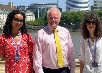 Clive Jones MP, welcomed Jasmine Dix, from The Holt, and Laima Dhimitri.