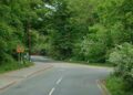 Peacock Lane turns into Old Wokingham Road at a bend, with a T-junction for Waterloo Road.