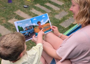 Henry and Cat reading Cat's book. Picture: Cat Davies