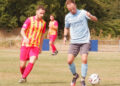 Woodley's Ollie Noyes (right) in action against Deportivo Falacia last Saturday. Pic: Andrew Batt.