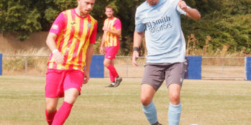 Woodley's Ollie Noyes (right) in action against Deportivo Falacia last Saturday. Pic: Andrew Batt.