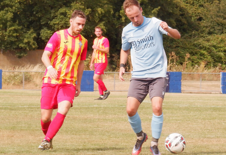 Woodley's Ollie Noyes (right) in action against Deportivo Falacia last Saturday. Pic: Andrew Batt.