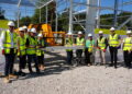 steel signing ceremony on site as part of the completion of the first structural steel frame.