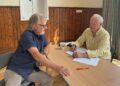 Clive Jones MP speaking to a constituent.