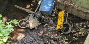 The rubbish in the Emm Brook near the Woosehill roundabout. Pic: Supplied.