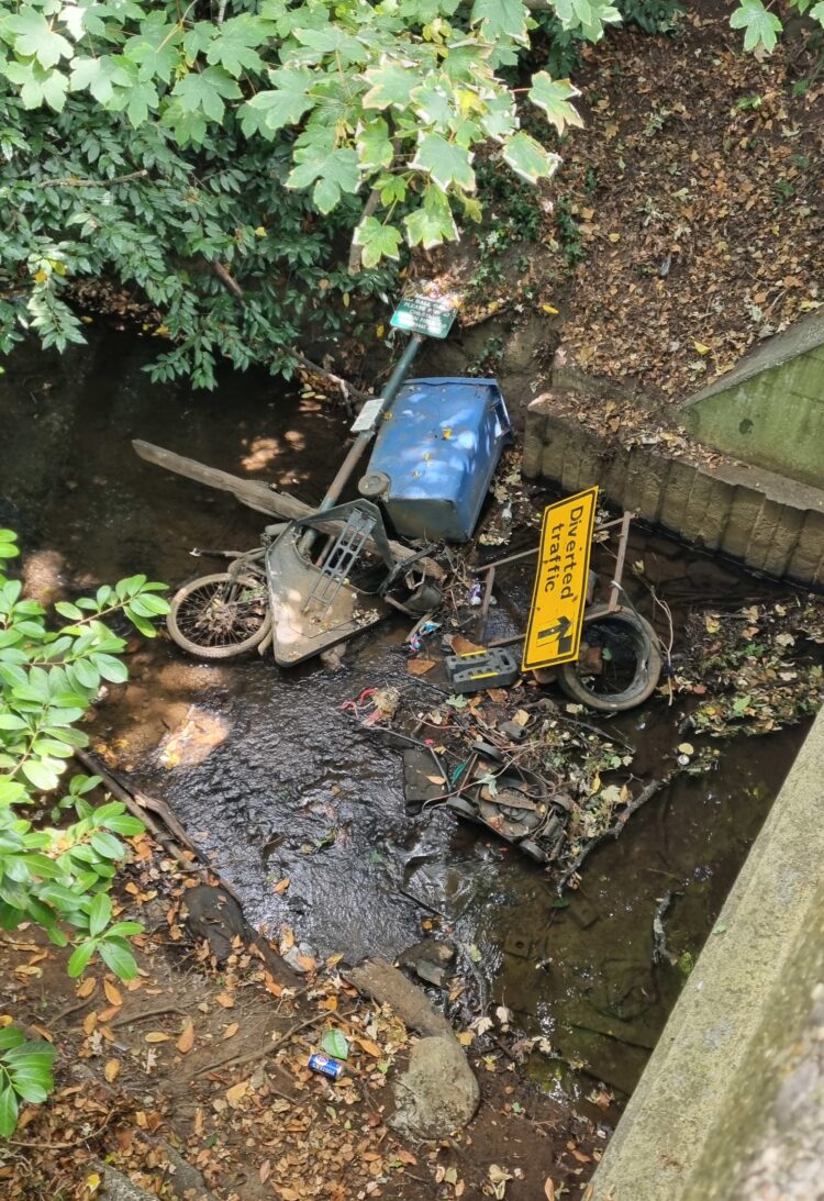 The rubbish in the Emm Brook near the Woosehill roundabout. Pic: Supplied.