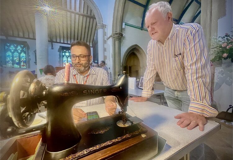 Clive Jones MP, (right), at the Wokingham Repair Cafe. Pic: Andrew Batt.