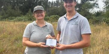 Pic: Clare Klesel, community garden manager (left) and Joe Richens, parks and countryside ranger (right). Photo by ranger team leader Joe Malyan.