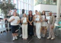 T Level Health students celebrate their success with teacher Wendy Williams.  Picture: Wokingham & Bracknell College
