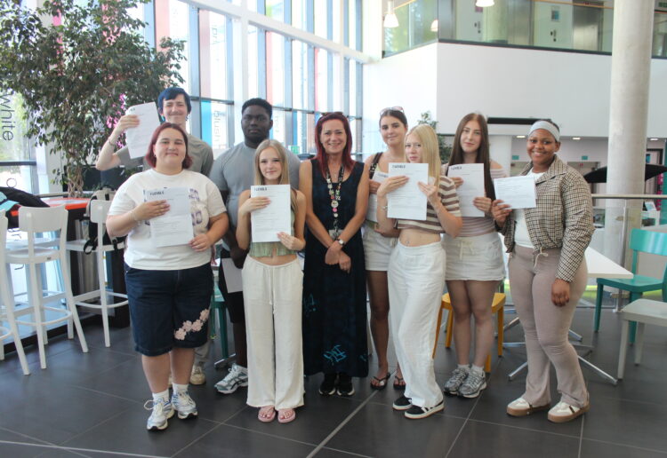 T Level Health students celebrate their success with teacher Wendy Williams. Picture: Wokingham & Bracknell College