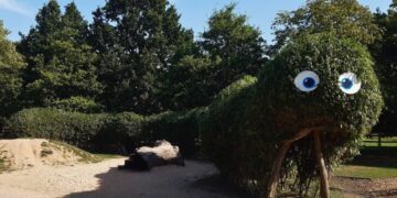 The living willow caterpillar in the nature play area has been carefully shaped, woven and restored by rangers.