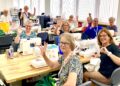 Volunteers at The Cowshed prepare items for people in crisis, just one of the charity's community activities. Picture: Emma Merchant