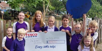 Three Tesco Wokingham gants will benefit local youngsters. PIcture: Tesco Wokingham
