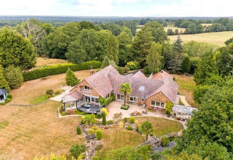 in Finchampstead is a property that treats its outdoor space not just as a garden, but as an immersive, secluded sanctuary.
